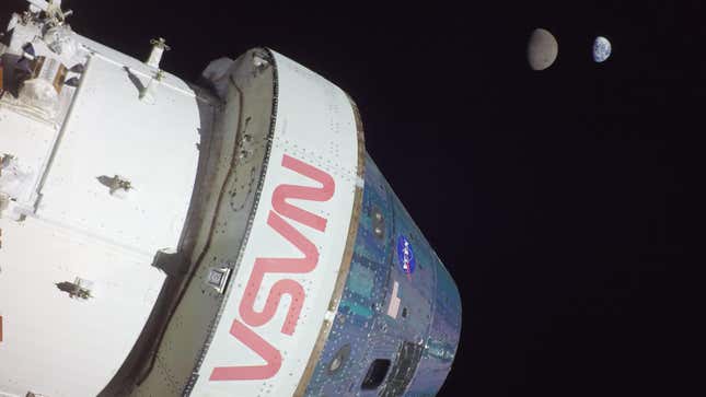 The Orion capsule during Artemis I with the Moon and the Earth in the background