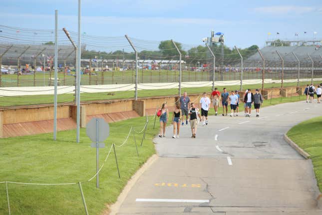 These fans are scoping out the Indianapolis Motor Speedway, the same way you should be scoping out the Coke Lot