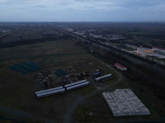 An aerial view of the wagons and other parts recovered from a train wreck, near Larissa city, central Greece, Wednesday, Feb. 28, 2024. Greece&#39;s deadliest rail disaster killed 57 people when a passenger train slammed into an oncoming cargo train. The tragedy shocked the country, with many of the victims being university students. (AP Photo)