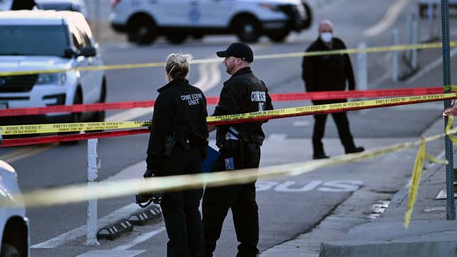 A photo of Denver police officers at a crime scene. 
