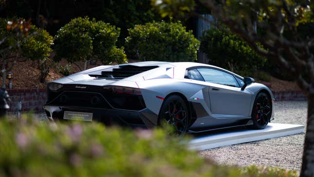 A Lamborghini Aventador Ultimae shows off design at a private lounge during Monterey Car Week 2022.