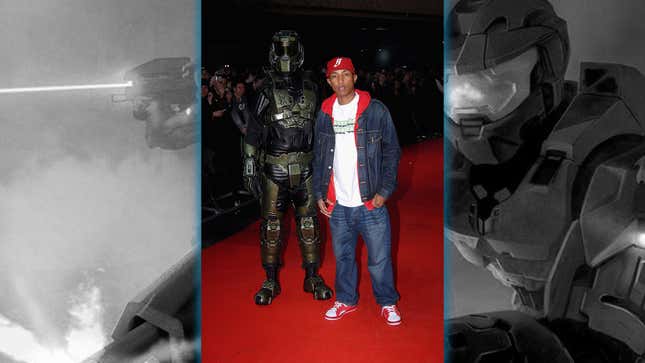 Pharrell and Master Chief stand on the red carpet. 
