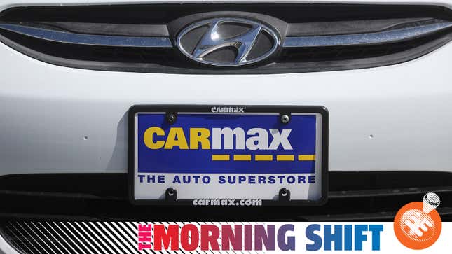 A CarMax license plate is displayed on a used car for sale at a CarMax superstore on September 24, 2020 in Colma, California. CarMax reported a better-than-expected 28 percent surge in second quarter earnings with revenues of $5.37 billion.