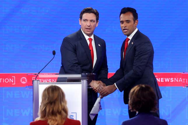 TUSCALOOSA, ALABAMA - DECEMBER 06: Republican presidential candidates Florida Gov. Ron DeSantis (L) and Vivek Ramaswamy shake hands at the conclusion of the NewsNation Republican Presidential Primary Debate at the University of Alabama Moody Music Hall on December 6, 2023 in Tuscaloosa, Alabama. Four GOP presidential hopefuls squared off during the fourth Republican primary debate without current frontrunner and former U.S. President Donald Trump, who has declined to participate in any of the previous debates