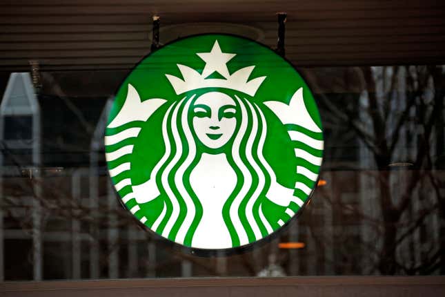 FILE - This Thursday, Jan. 12, 2017, file photo shows a Starbucks logo sign in the window of one of the chain&#39;s cafes in Pittsburgh. Starbucks reports their earnings on Tuesday, Jan. 30, 2024. (AP Photo/Gene J. Puskar, File)