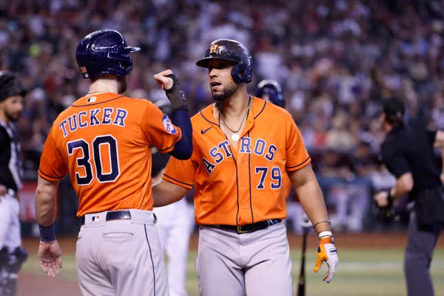 PHOENIX, ARIZONA - OCTOBER 01: Jose Abreu #79 of the Houston Astros celebrates with Kyle Tucker #30 after hitting a two-run home run during the seventh inning against the Arizona Diamondbacks at Chase Field on October 01, 2023 in Phoenix, Arizona. (Photo by Chris Coduto/Getty Images)