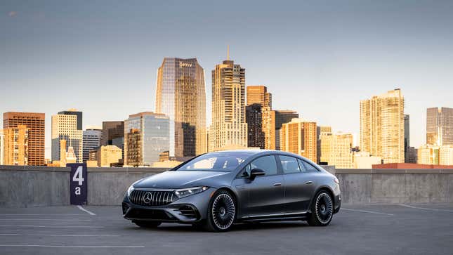 A photo of a matte black Mercedes EQS sedan. 