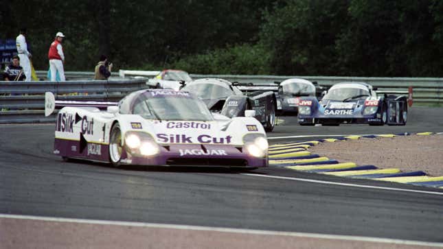 A group of cars run through the new chicane set up by Nissan on the famous Mulsanne straight on June 14, 1990 at Le Mans during the second practice session of the 58th 24 Hours of Le Mans. 