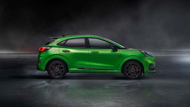 A photo of a green Ford Puma SUV. 