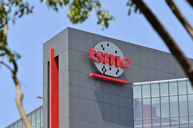 exterior view of TSMC logo and signage on a building 