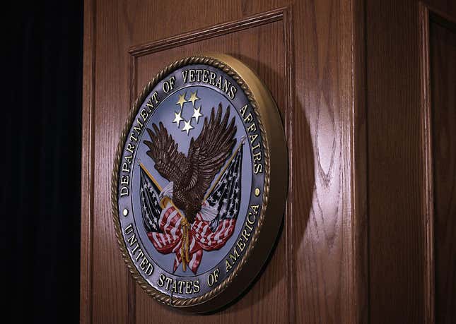 WASHINGTON, DC - SEPTEMBER 08: The sign of the Veterans Affairs Department is hung on the podium as U.S. Secretary of Veterans Affairs Robert McDonald speaks during a news conference at Veterans Affairs Department September 8, 2014, in Washington, DC. Secretary McDonald shared stories of veterans he met across the country. He also outlined his key priorities to serve veterans better. 