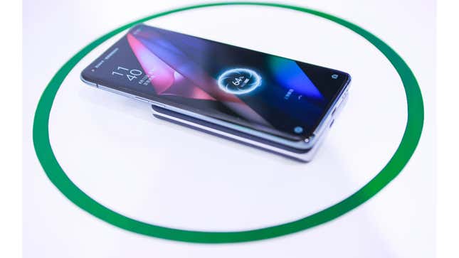 A photo of an Oppo smartphone charging with its new MagVOOC tech