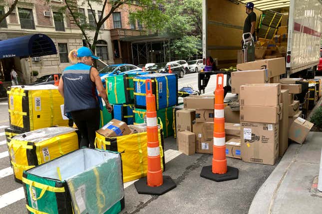 File - An Amazon truck is unloaded for deliveries on New York&#39;s Upper West Side, Aug. 14, 2023. Amazon releases results on Thursday, Feb. 1, 2024. (AP Photo/Richard Drew, File)