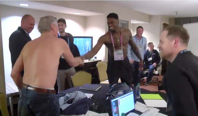 Watch as Pete Carroll goes shirtless with Seahawks pick D.K. Metcalf