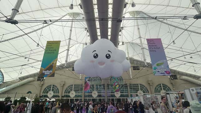 A cloud inflatable floats over TwitchCon. 