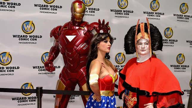 Cosplayers dressed as Iron Man, Wonder Woman, and Padmé Amidala pose together at the 2016 Wizard World Comic Con in Chicago.