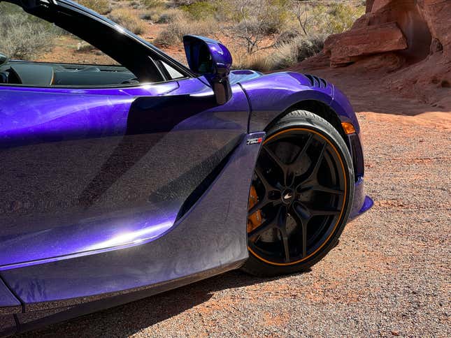 Front wheels of a purple McLaren 750S Spider