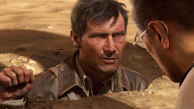 Indiana Jones kuma gömülüyken yumruğunu kaldırıyor. 