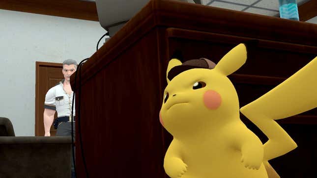 Pikachu eavesdrops behind a desk.