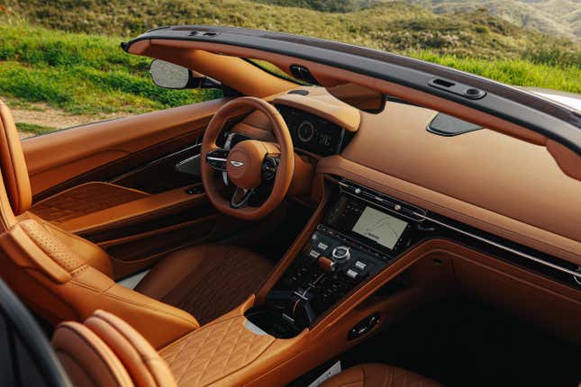 Interior of a brown Aston Martin DB12 Volante