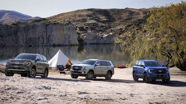 A photo of tree Ford Everest SUVs. 