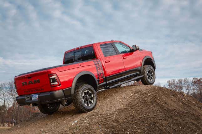 Ram 2500 Power Wagon pickup truck climbing a dirt pile