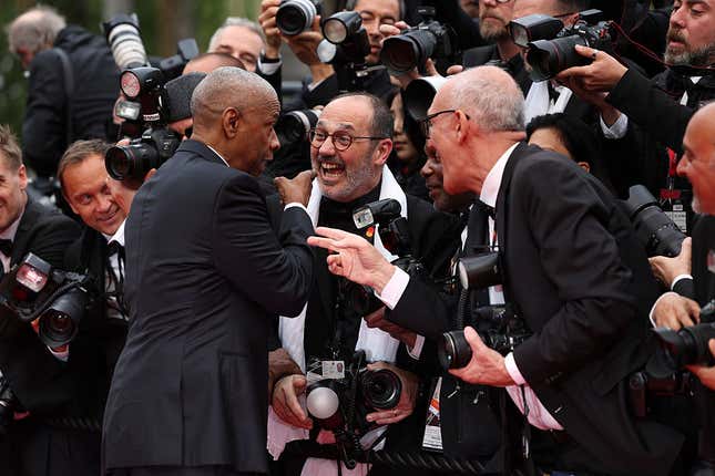Image for article titled Lip Reader Reveals What Denzel Washington Said To The Photographer Who Tried Him At Cannes