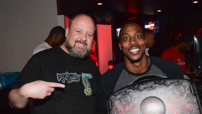 Aaron Greenberg and Atlanta Hawks Center Dwight Howard attend the Gears Of War 4 launch event at Studio No. 7 on October 10, 2016 in Atlanta, Georgia.