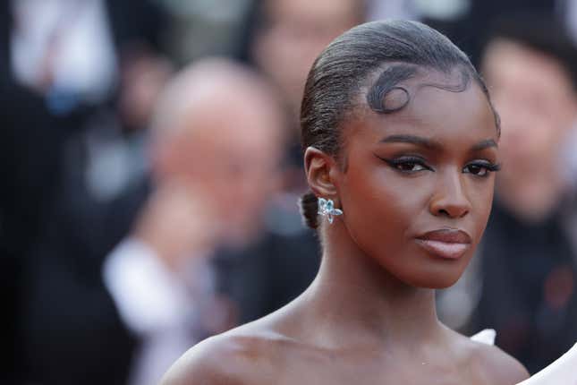 Image for article titled This Black Model May Have Broken Cannes' Strict No-Nudity Dress Code, But Her Outfit is Turning Every Head...