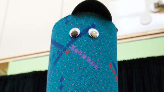 A piece of Portland International Airport carpet with googly eyes