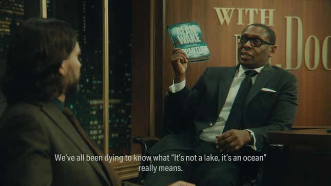 Mr. Door says "We've all been dying to know what 'It's not a lake, it's an ocean' really means" to Alan Wake on a talk show set.