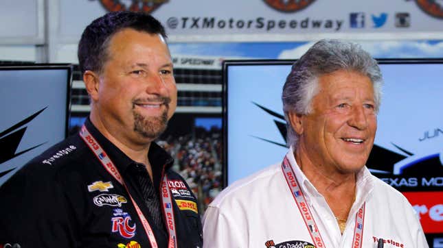 Michael Andretti stands with his father Mario Andretti