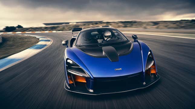 Blue McLaren Senna driving on a track