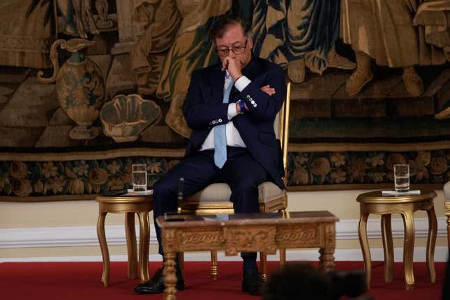 Colombian President Gustavo Petro attends a swearing-in ceremony for the newly appointed attorney general at the Presidential Palace in Bogota, Colombia, Friday, March 22, 2024. (AP Photo/Fernando Vergara)