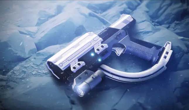 The Halo pistol lays on snowy ground.