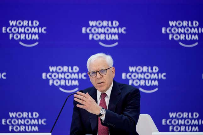 Co-founder and co-chairman of the private equity firm The Carlyle Group David Rubenstein speaks in the panel &quot;The Global Economic Outlook&quot; on the last day of the forum&#39;s Annual Meeting in Davos, Switzerland, Friday, Jan. 19, 2024. (AP Photo/Markus Schreiber)