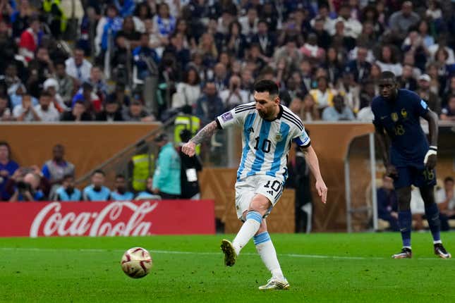 FILE - Argentina&#39;s Lionel Messi scores the opening goal from the penalty spot during the World Cup final soccer match between Argentina and France at the Lusail Stadium in Lusail, Qatar, on Dec. 18, 2022. Sotheby&#39;s is to auction off six first half shirts worn by Lionel Messi during Argentina&#39;s winning run at the soccer World Cup in Qatar in 2022, including the one in the final, and thinks they could become the most valuable collection of sports memorabilia ever sold at potentially more than $10 million. (AP Photo/Natacha Pisarenko, File)