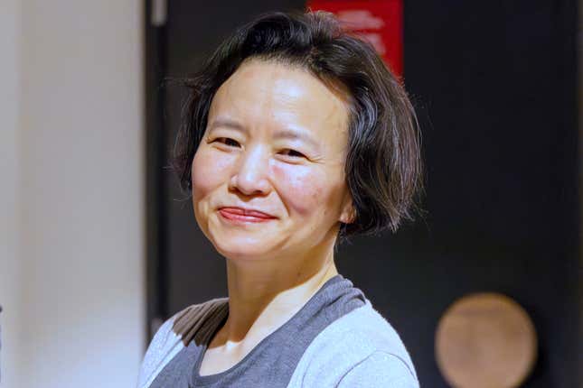 FILE - Australian journalist Cheng Lei smiles after she arrives at Tullamarine Airport in Melbourne on Wednesday Oct. 11, 2023. Lei says she spent more than three years in detention in China for breaking an embargo with a television broadcast. (Sarah Hodges/DFAT via AP, FILE)