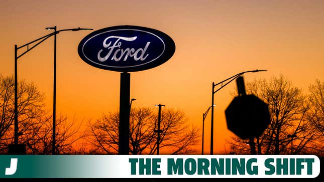 A photo of a large Ford Blue Oval logo at sunset. 