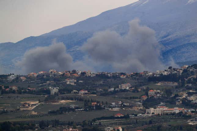 Smoke rises after Israeli air strikes on the outskirts of Khiam, a town near the Lebanese-Israeli border, seen from the town of Marjayoun, south Lebanon, Thursday, Dec. 21, 2023. Lebanon&#39;s militant Hezbollah group has been exchanging fire with Israeli troops along the tense frontier, which seen violent exchanges since Oct. 8 a day after the Palestinian militant Hamas group attacked southern Israel. (AP Photo/Mohammed Zaatari)