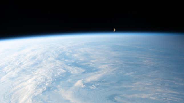 The waning gibbous Moon above Earth’s horizon, as viewed from the ISS on December 8, 2023.