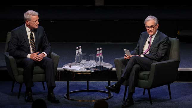 Powell (right) speaks to the Economic Club of New York on Oct. 19, 2023