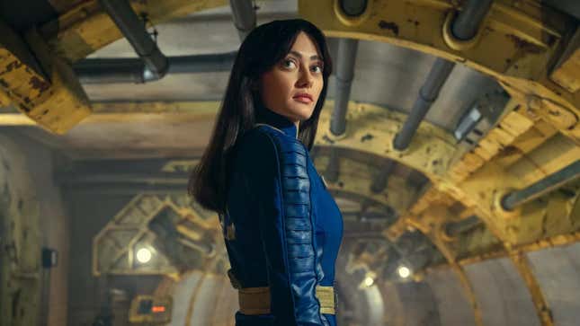 A promotional image of Lucy, played by Ella Purnell, inside of one of the vaults in Fallout.