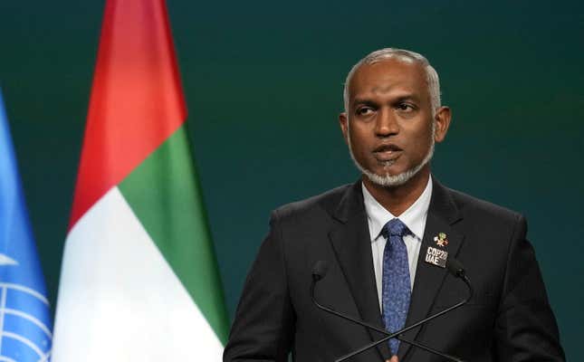 FILE - Maldives President Mohamed Muizzu speaks during a plenary session at the COP28 U.N. Climate Summit, Friday, Dec. 1, 2023, in Dubai, United Arab Emirates. The Maldives government has confirmed giving clearance to a Chinese ship to dock in its port, a move which could further irk India with whom the tiny archipelago nation is involved in a diplomatic spat. (AP Photo/Rafiq Maqbool, File)