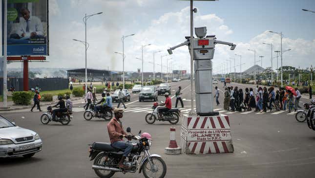 A robot officer watches over traffic.