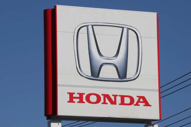 FILE - The logo of Honda Motor Co., is seen in Yokohama, near Tokyo on Dec. 15, 2021. Honda is recalling nearly 250,000 vehicles in the U.S. because bearings can fail, causing the engines to stall and increasing the risk of a crash. The recall covers certain 2018 and 2019 Honda Pilot SUVs and Odyssey minivans, and some 2017 and 2019 Ridgeline pickup trucks. (AP Photo/Koji Sasahara, File)