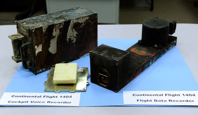 FILE - The cockpit voice recorder, left, and the flight data recorder from Continental flight 1404 airplane accident on display at the National Transportation Safety Board headquarters in Washington, Dec. 22, 2008. Federal accident investigators are pushing for better cockpit voice recorders. They are pointing to limits of the device on the jetliner that suffered a door-panel blowout last month over Oregon. The National Transportation Safety Board said Tuesday, Feb. 13, 2024 that the Federal Aviation Administration should require all current planes to have recorders that can capture 25 hours of audio, up from the current standard of two hours. (AP Photo, file)