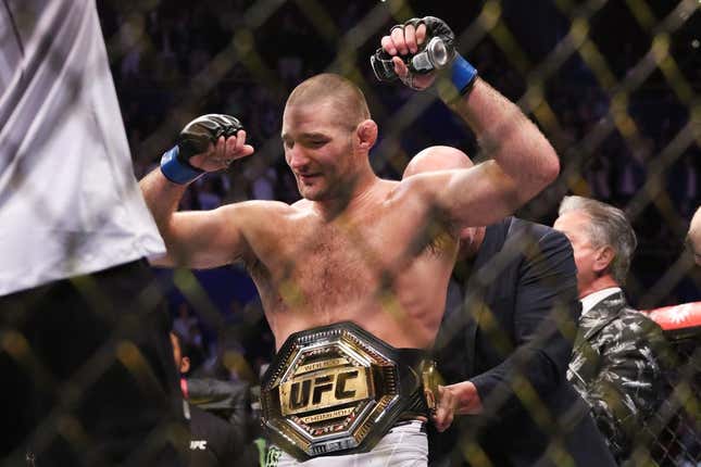 Sep 9, 2023; Sydney, NSW, AUSTRALIA; Sean Strickland (blue gloves) celebrates after defeating Israel Adesanya (not pictured) during UFC 293 at Qudos Bank Arena.