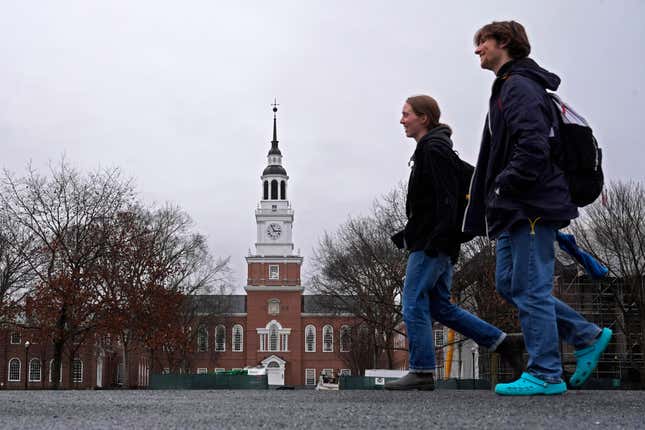 FILE - Students cross the campus of Dartmouth College, March 5, 2024, in Hanover, N.H. While tax pros say it&#39;s great for college students to start filing their own forms, parents and students should double-check everything carefully before anyone pushes the &quot;submit&quot; button. (AP Photo/Robert F. Bukaty, File)