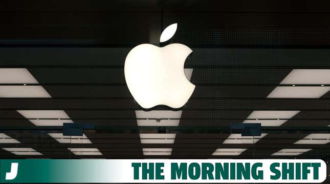 An Apple corporate logo hangs above the front door of their store in the Garden State Plaza Mall on November 4, 2023, in Paramus, New Jersey.